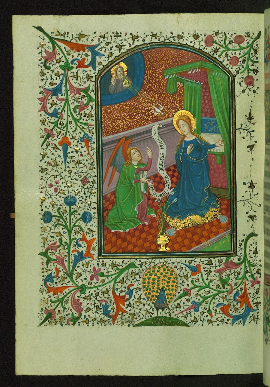 Página de um livro de horas com uma miniatura da Anunciação, o anjo e Maria numa moldura dourada