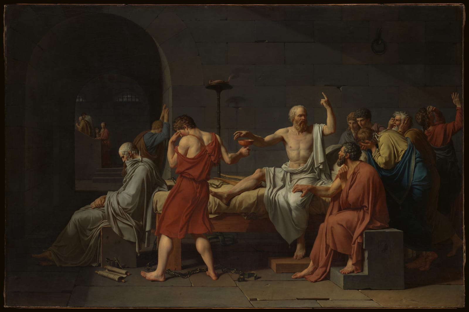 Pintura neoclássica: Sócrates, de torso nu, no centro de uma cela, ergue o dedo e estende a mão para a taça de cicuta que um jovem lhe oferece; ao redor, amigos chorando
